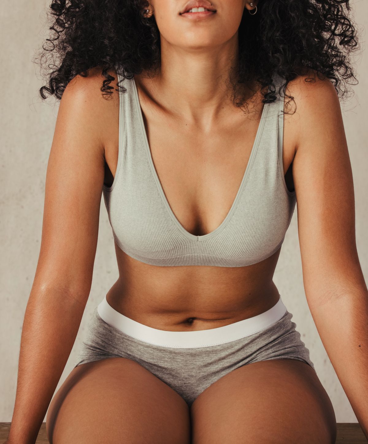 Woman in comfortable lingerie posing for the camera.